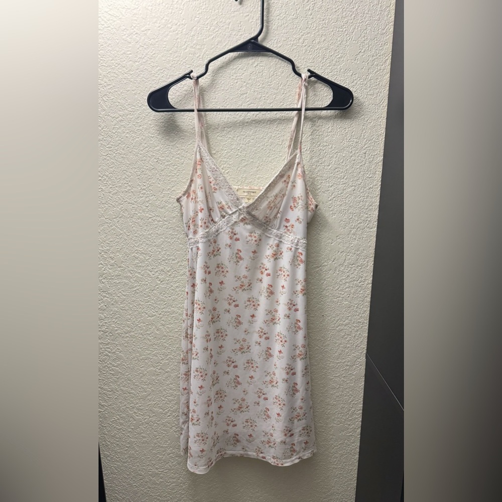 I am selling this mini white flower detailed dress, it was purchased at Ross.